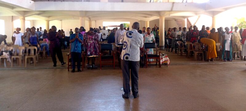 Pastor before congregation